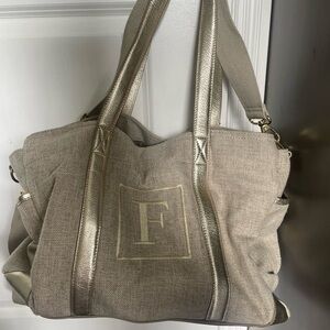 Pottery barn diaper bag with shoulder strap and tons of pockets! F monogram